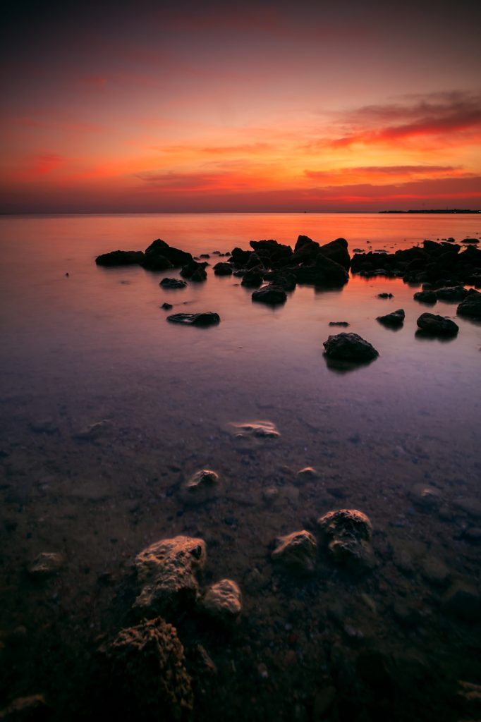 Scenic shot of the colorful sunrise reflecting on the seawater at Hurghada, Egypt