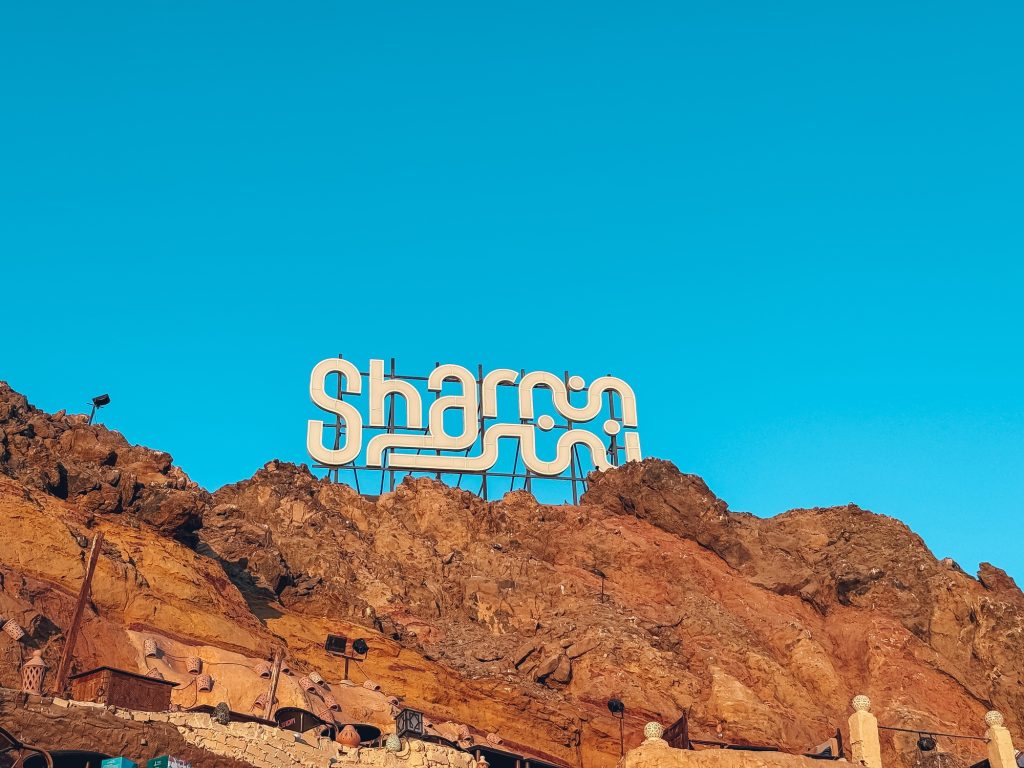 Sharm el sheikh sign standing on a rocky mountain in egypt